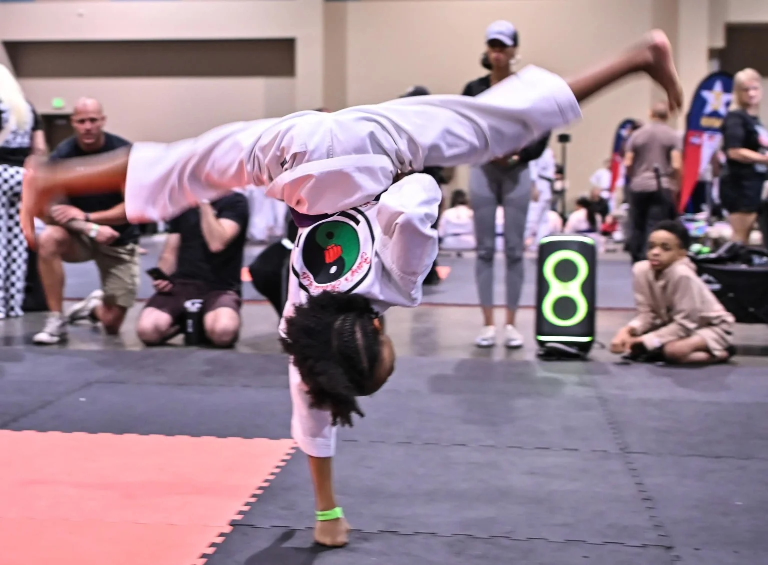Dominic in an acrobatic martial arts move